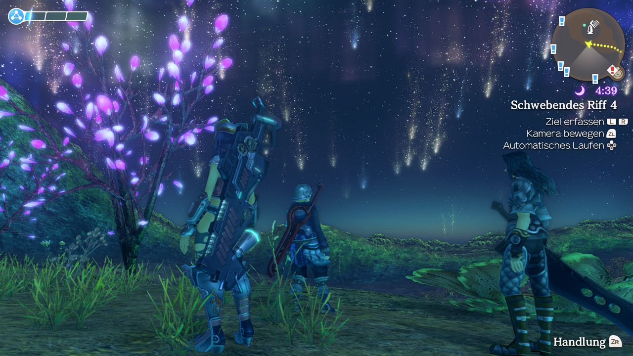 Sharla, Shulk und Dunban in einer magischen Landschaft bei Nacht.